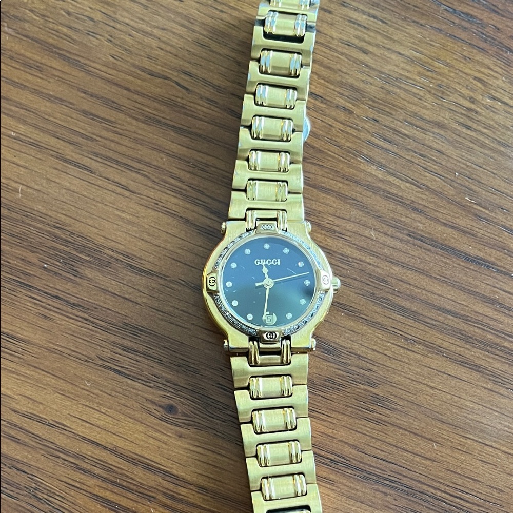 Gucci Gold Tone Bracelet Watch with Black Dial and Crystal Accents